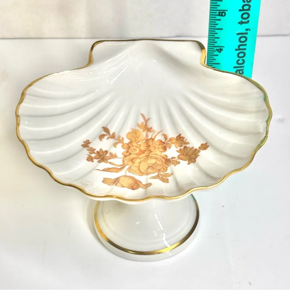Vintage Limoges France porcelain shell-shaped pedestal dish.